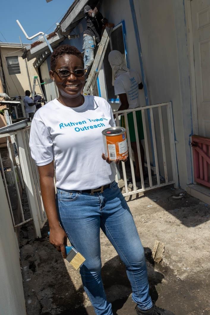 Shannon Fairweather, Coordinator for the Ruthven Towers Outreach Programme, was all smiles before lending a helping hand to paint the nursery.